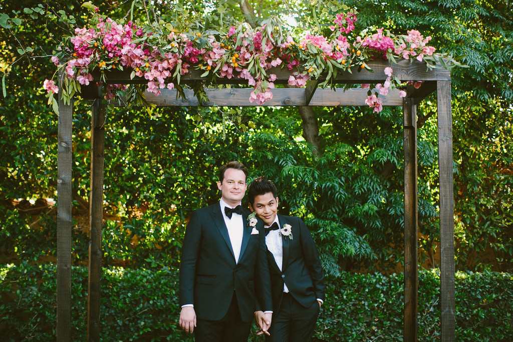 groom + groom & bougainvillea arbor.